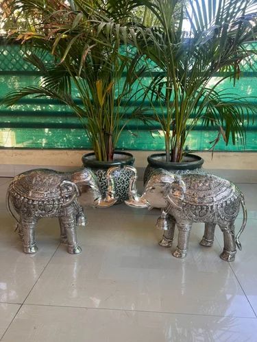 Silver-plated or aluminum elephant statues