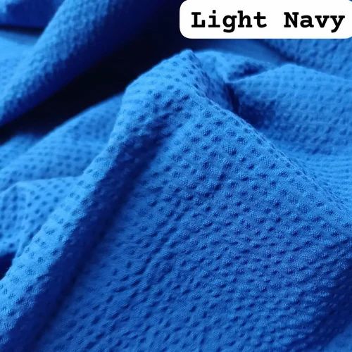 Eco-friendly cotton seersucker fabric is dyed with azo-free colors
