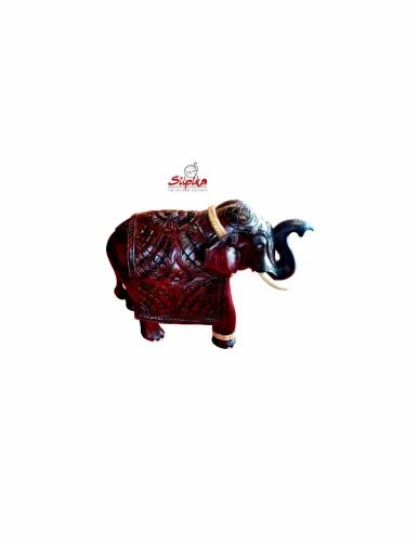 Brown Wooden Silpika Flower Design Trunk Up Elephant, For Interior Decor, Size/Dimension: 16 Inch
