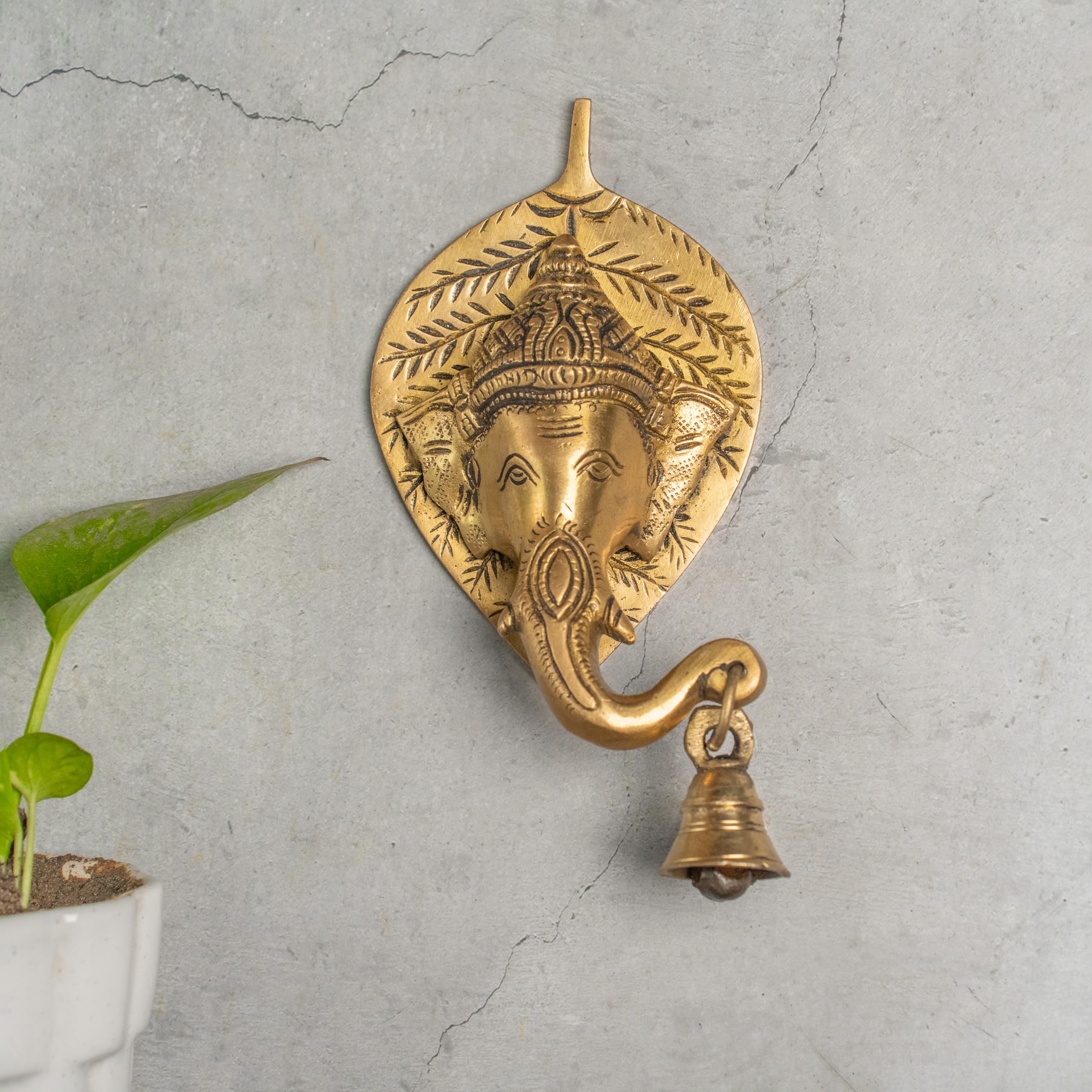 Lord Ganesha on Leaf with Bell 