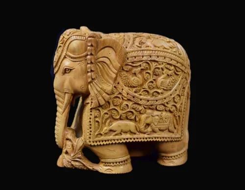 Wooden sandalwood white Elephant Statue, For Interior Decor, Size/Dimension: Max. 8 Inch